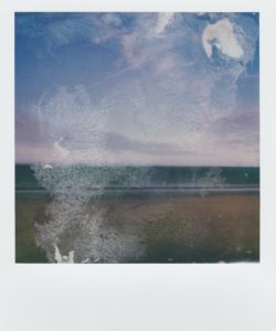 Polaroidfoto mit Schichtablösung